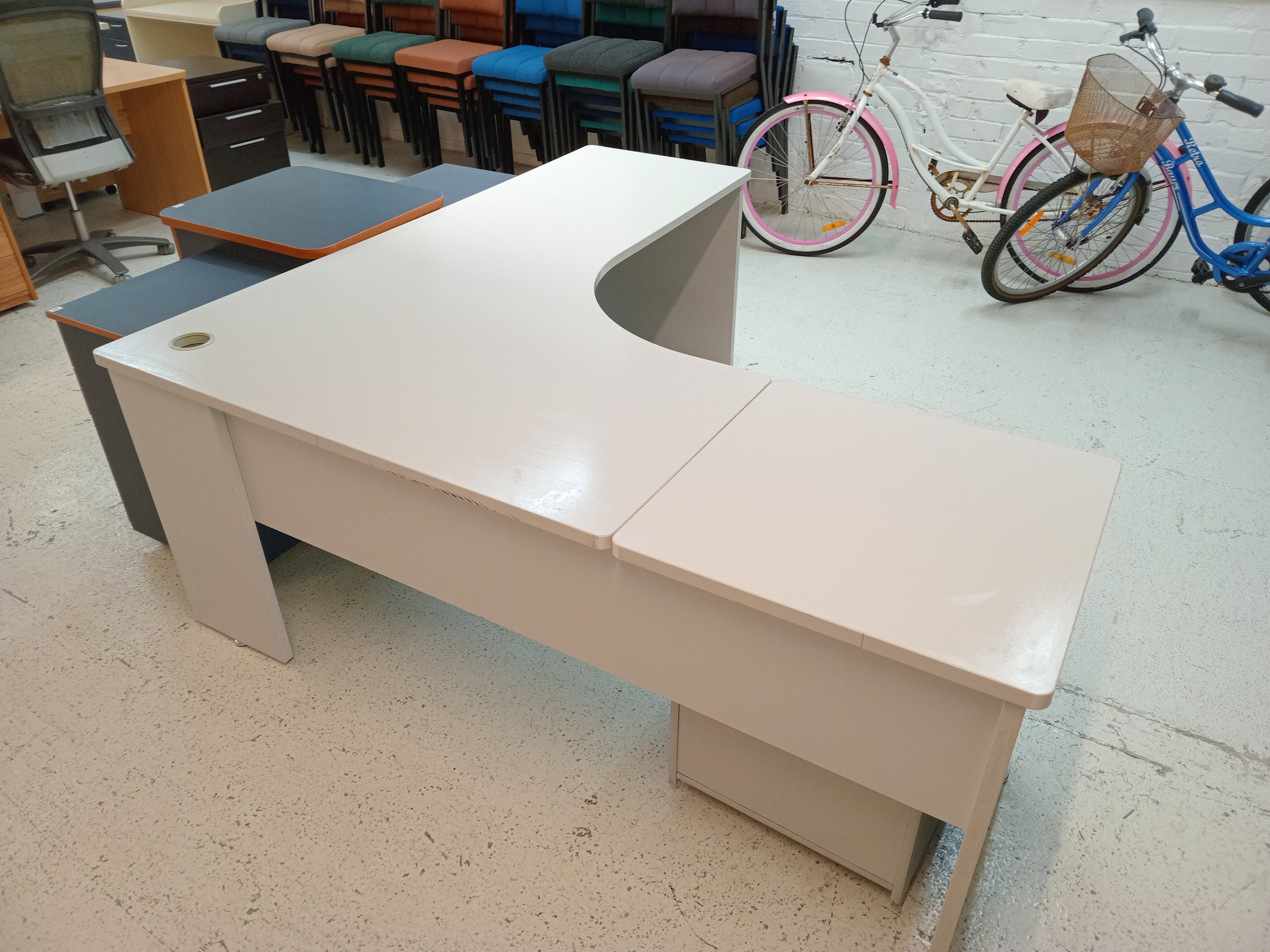 Light grey L-shaped desk