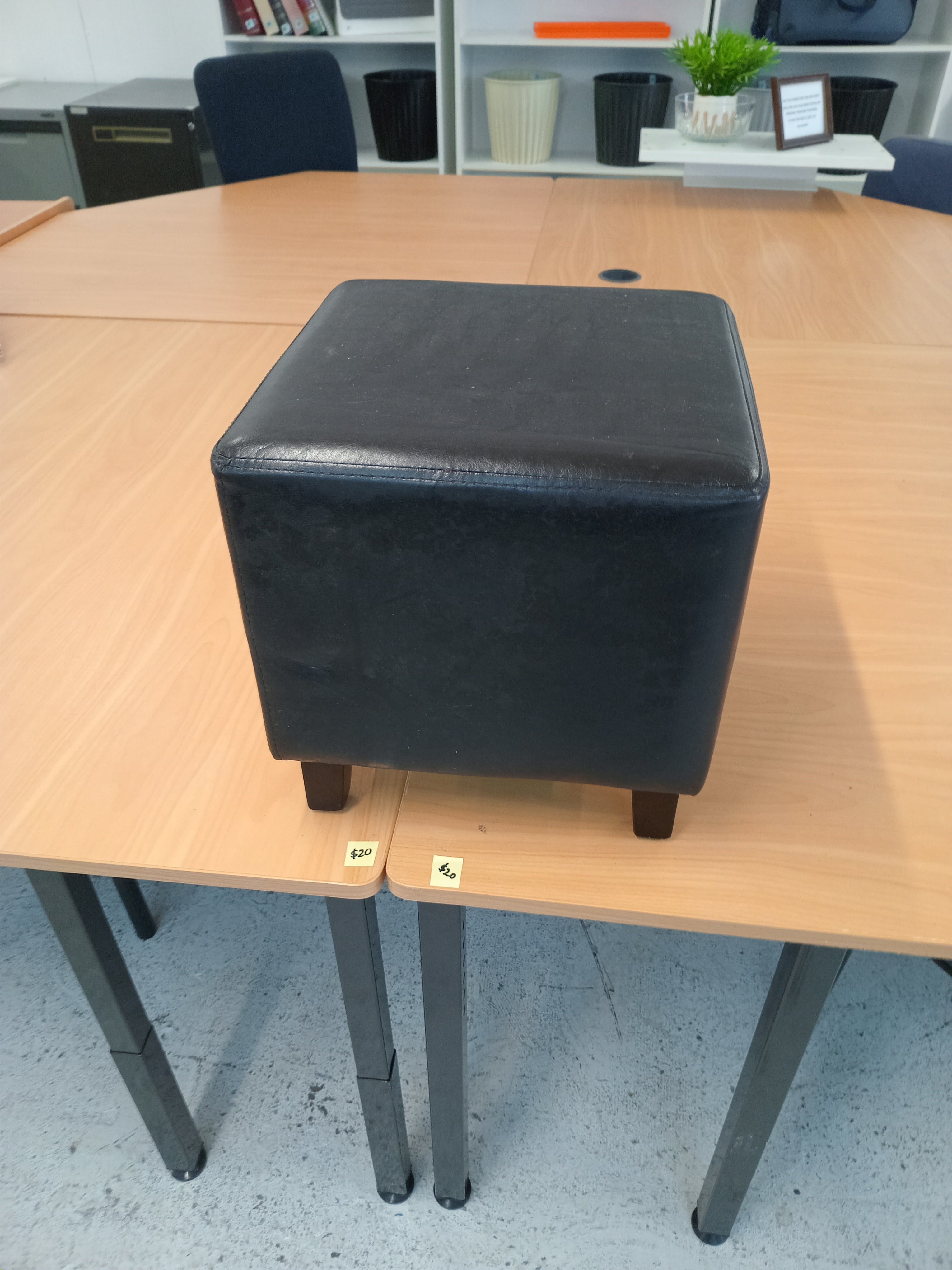 Square brown foot rest
