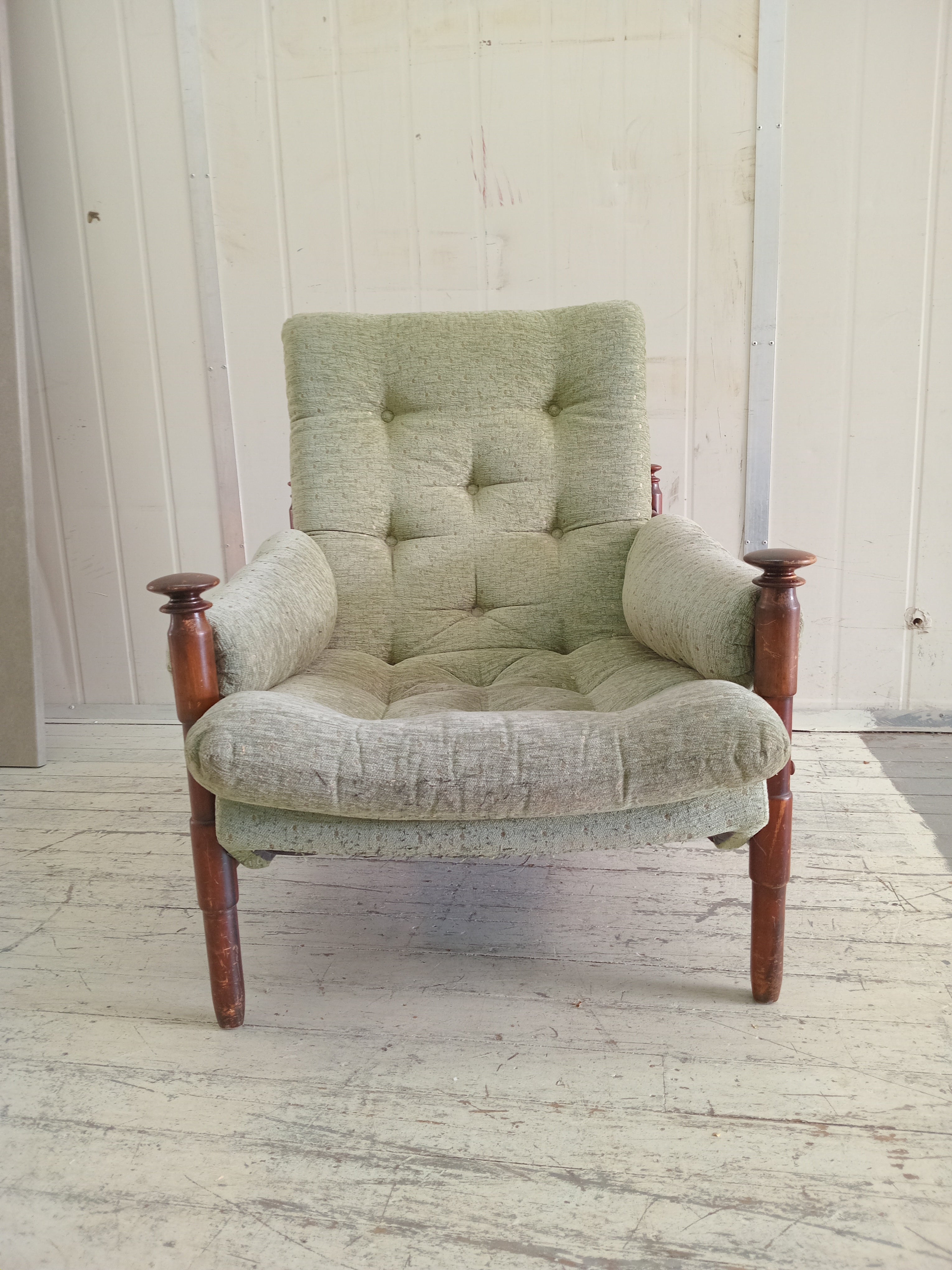 Light green lounge armchair